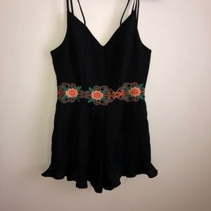 Black Romper with Floral Detail